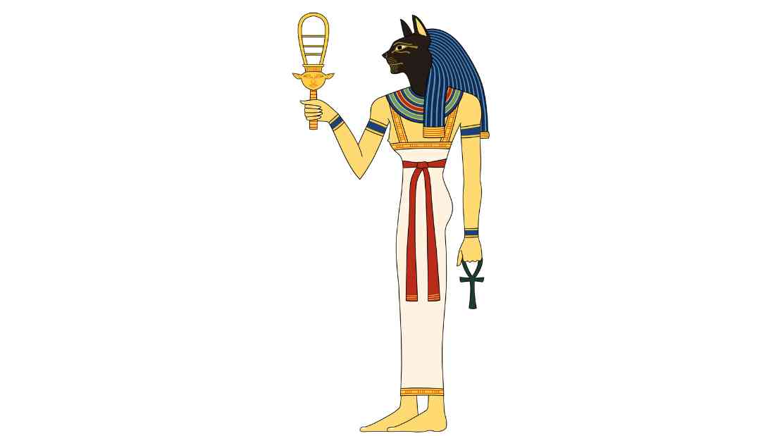 A representation of the Egyptian Goddess Bastet as a woman with the head of a Cat, holding an Ankh and the Hathor Sistrum as she was depicted in the Tomb of Mentuherkhepeshef.