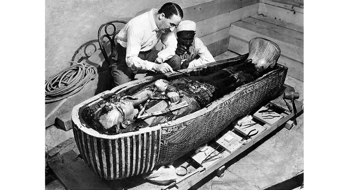 Howard Carter opens the innermost shrine of King Tutankhamun's tomb. Exclusive to The Times, Public domain, via Wikimedia Commons 