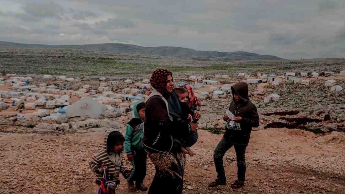 Refugees in a war zone